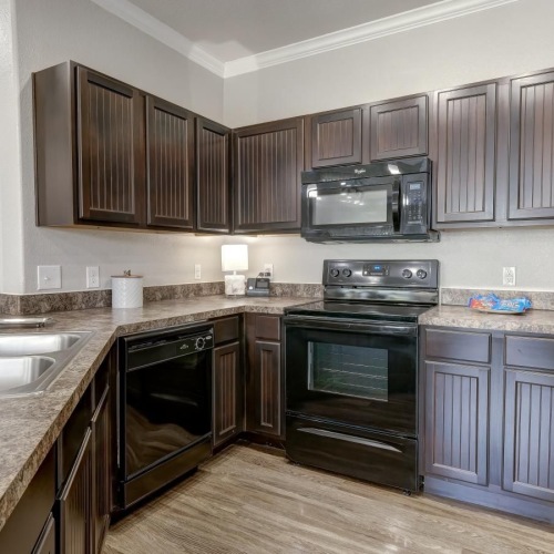 a kitchen with stainless steel appliances
