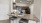 a kitchen with a marble counter top