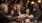 a group of people sitting at a table with drinks