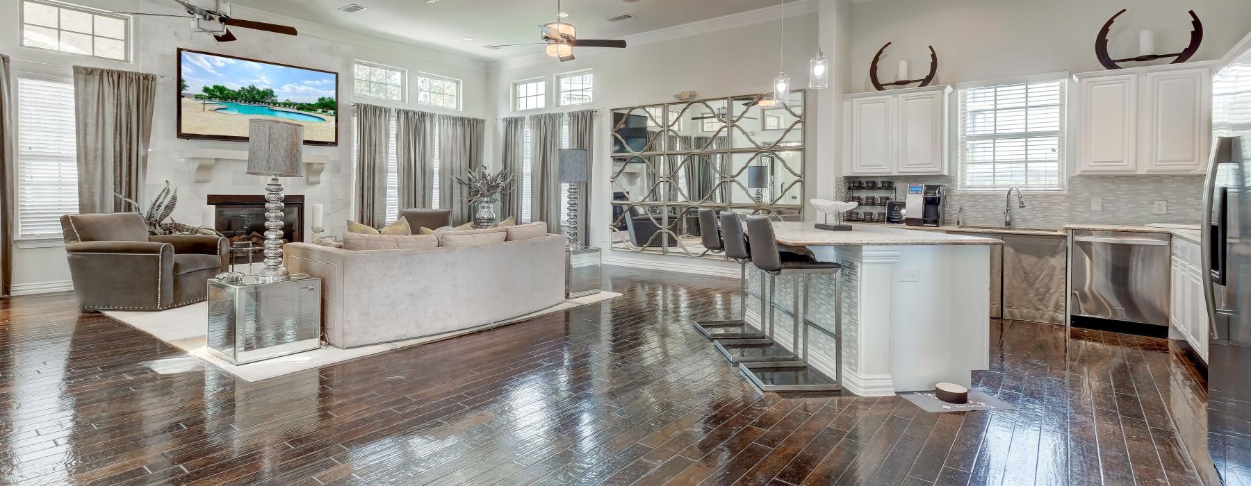 a large kitchen with a large tile floor